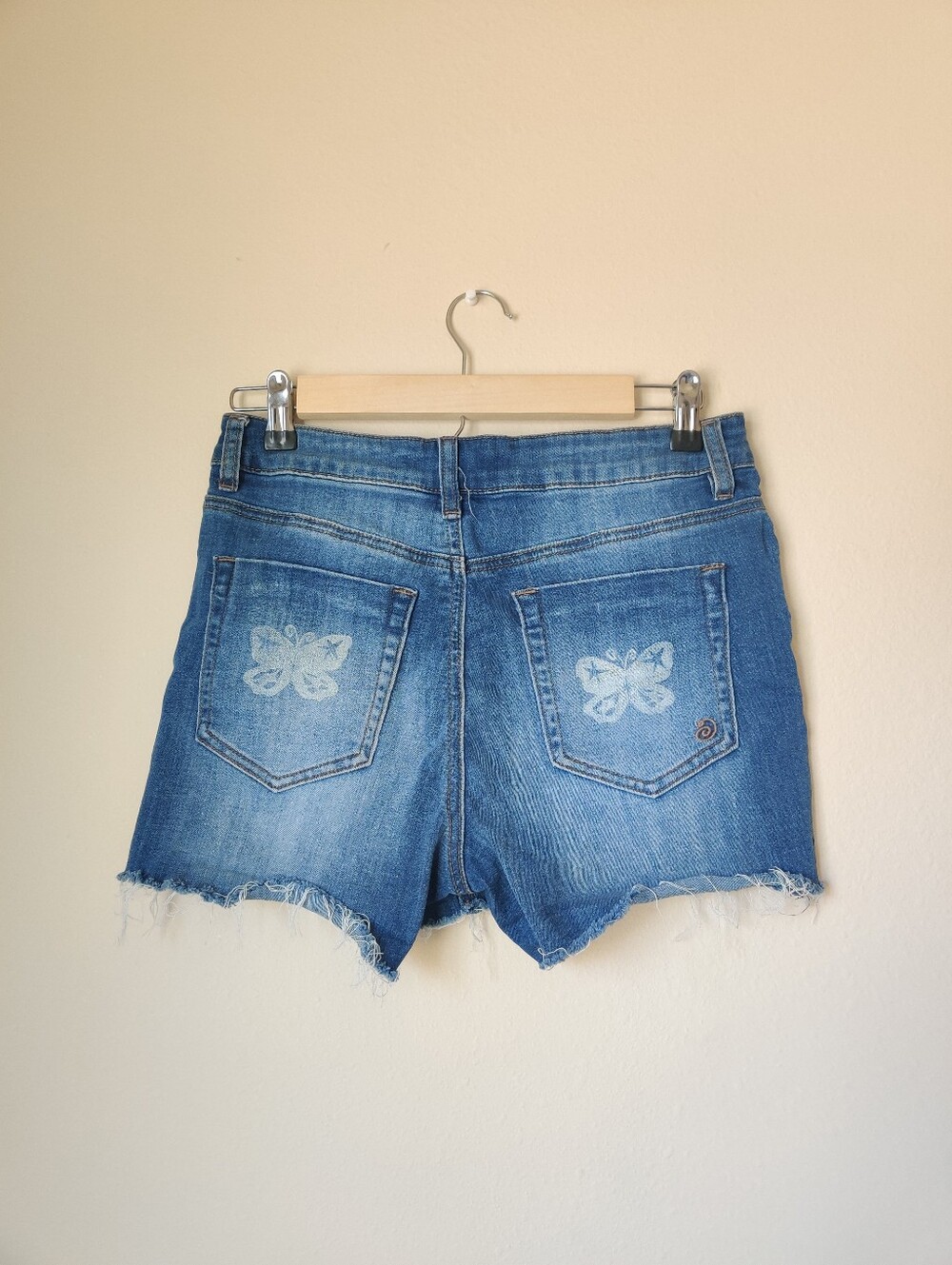 Butterfly printed denim cutoff shorts